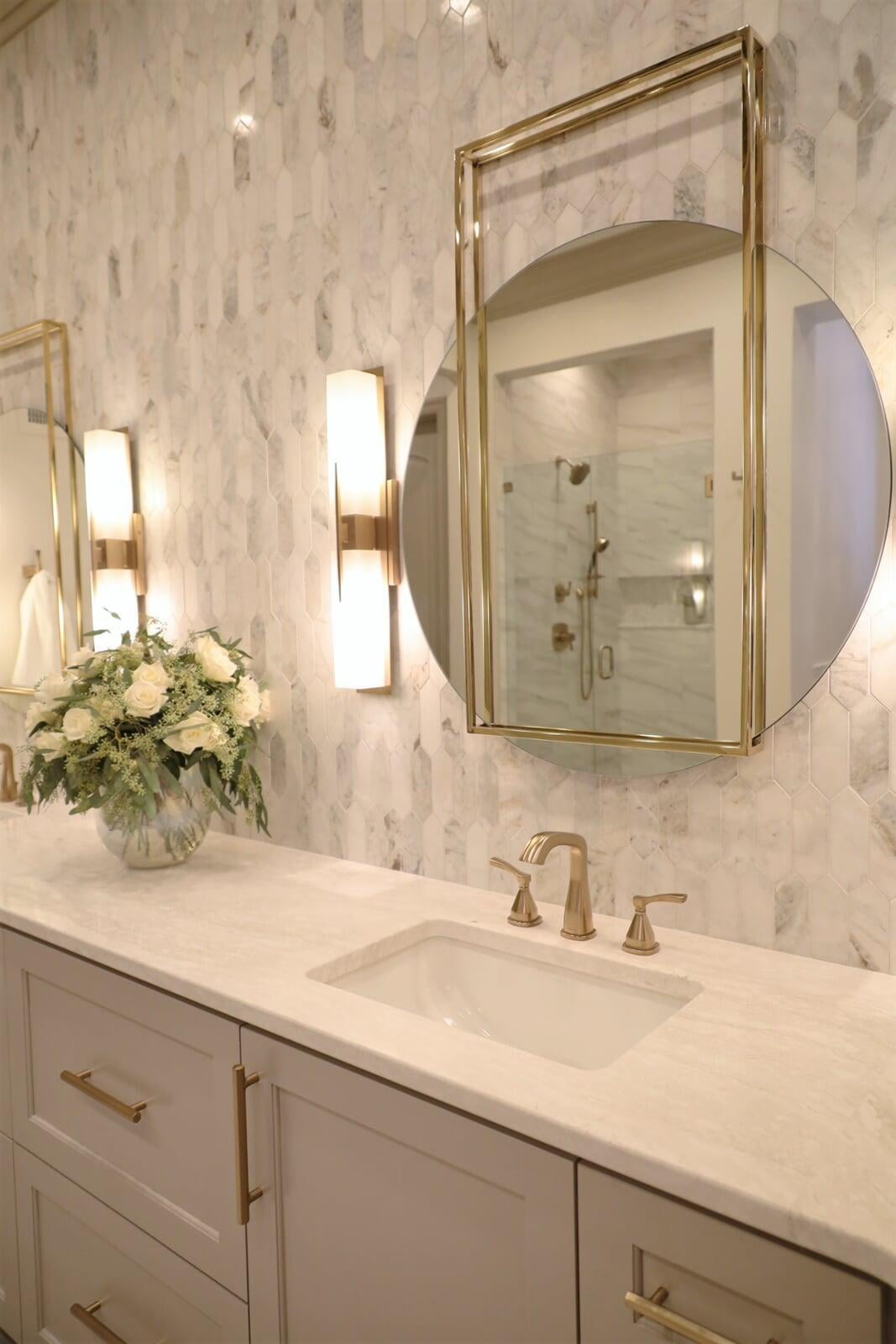 marble picket tile, gold fixtures, gray cabinet, picket
