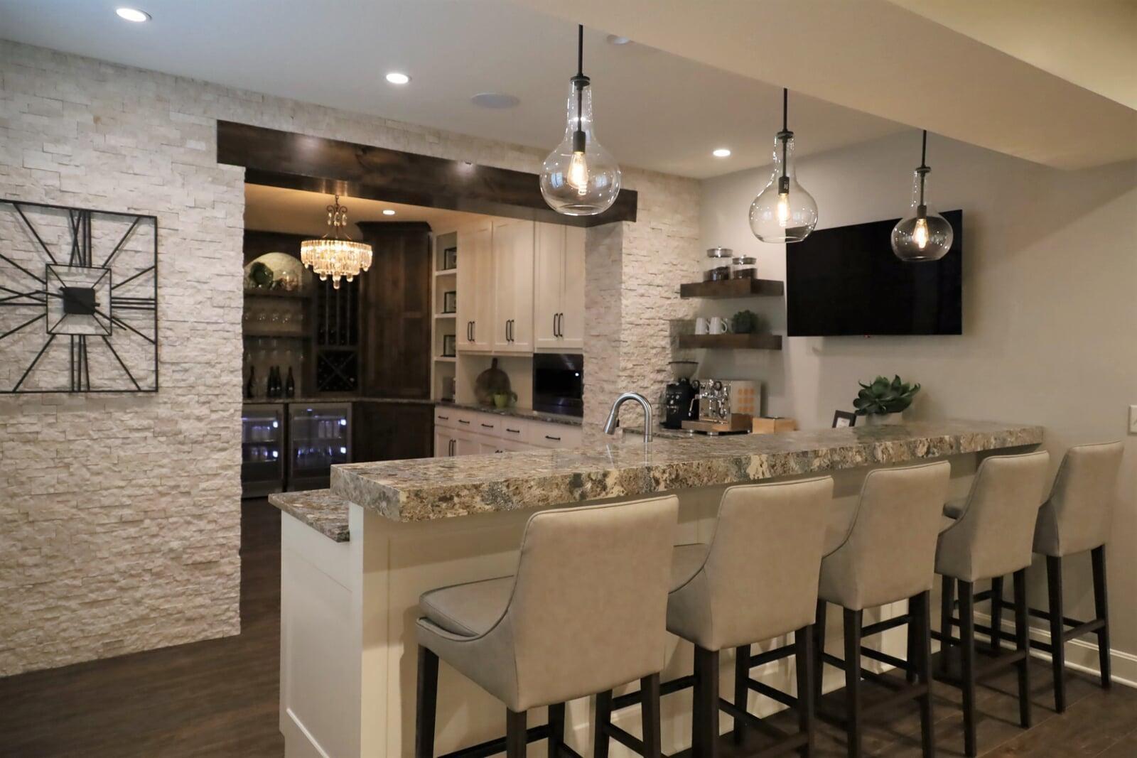 Stone wall, glass pendants, cambria, wine bar